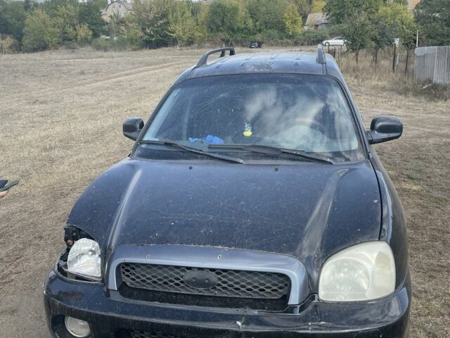 Черный Хендай Санта Фе, объемом двигателя 2.7 л и пробегом 150 тыс. км за 1500 $, фото 1 на Automoto.ua