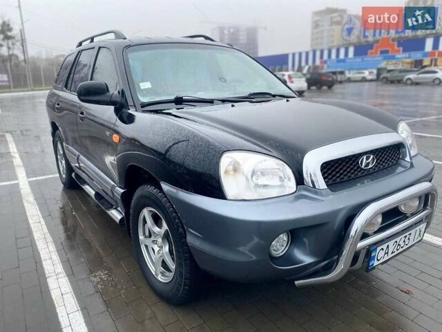 Чорний Хендай Санта Фе, об'ємом двигуна 1.99 л та пробігом 360 тис. км за 6400 $, фото 1 на Automoto.ua