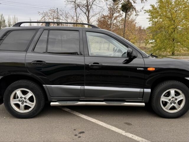 Черный Хендай Санта Фе, объемом двигателя 0 л и пробегом 300 тыс. км за 4077 $, фото 1 на Automoto.ua