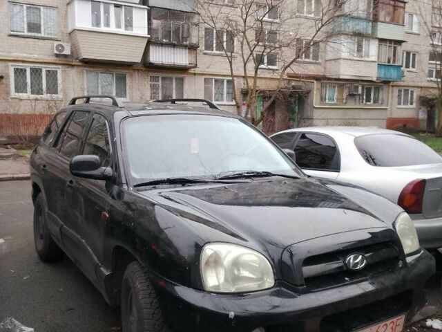 Черный Хендай Санта Фе, объемом двигателя 2.2 л и пробегом 314 тыс. км за 3547 $, фото 1 на Automoto.ua