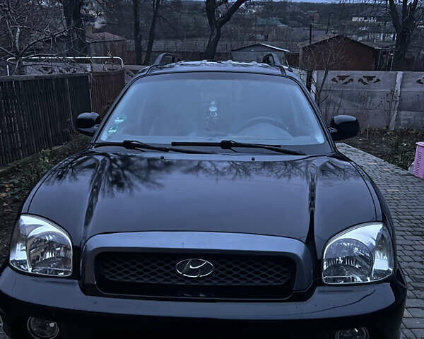 Чорний Хендай Санта Фе, об'ємом двигуна 2.35 л та пробігом 189 тис. км за 6499 $, фото 1 на Automoto.ua