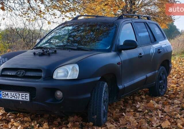Чорний Хендай Санта Фе, об'ємом двигуна 2 л та пробігом 306 тис. км за 4199 $, фото 1 на Automoto.ua