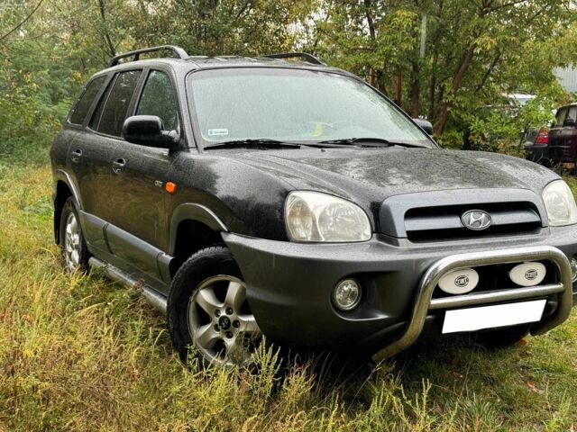 Черный Хендай Санта Фе, объемом двигателя 2 л и пробегом 273 тыс. км за 3800 $, фото 1 на Automoto.ua