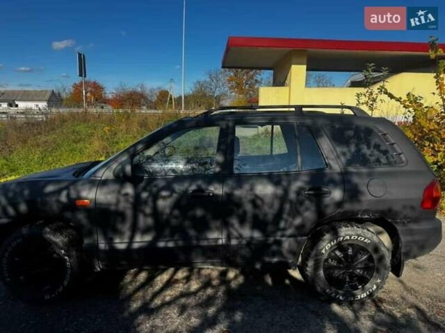 Чорний Хендай Санта Фе, об'ємом двигуна 2 л та пробігом 385 тис. км за 3000 $, фото 1 на Automoto.ua