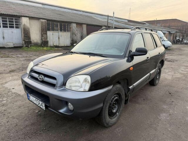 Черный Хендай Санта Фе, объемом двигателя 2 л и пробегом 283 тыс. км за 3300 $, фото 1 на Automoto.ua