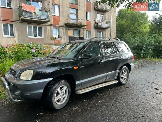 Чорний Хендай Санта Фе, об'ємом двигуна 2 л та пробігом 266 тис. км за 4000 $, фото 1 на Automoto.ua