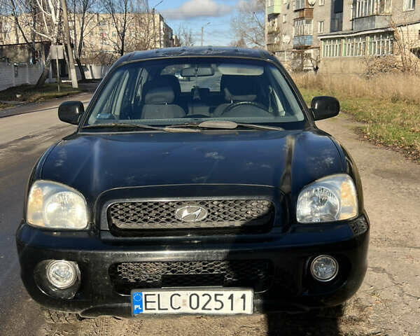 Чорний Хендай Санта Фе, об'ємом двигуна 1.99 л та пробігом 430 тис. км за 3200 $, фото 1 на Automoto.ua