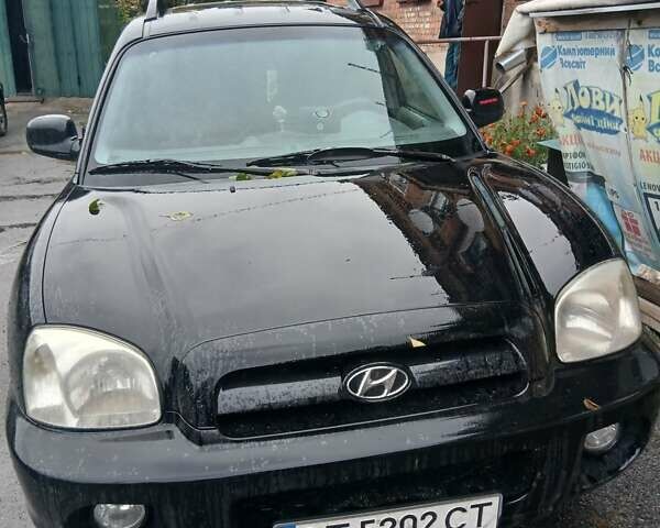 Черный Хендай Санта Фе, объемом двигателя 1.99 л и пробегом 190 тыс. км за 5950 $, фото 1 на Automoto.ua