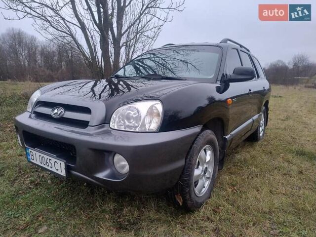 Чорний Хендай Санта Фе, об'ємом двигуна 2 л та пробігом 203 тис. км за 7100 $, фото 1 на Automoto.ua