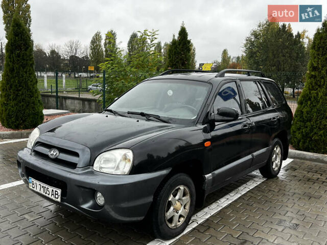 Черный Хендай Санта Фе, объемом двигателя 2 л и пробегом 270 тыс. км за 4300 $, фото 1 на Automoto.ua