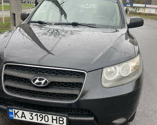 Черный Хендай Санта Фе, объемом двигателя 2.19 л и пробегом 214 тыс. км за 9700 $, фото 1 на Automoto.ua