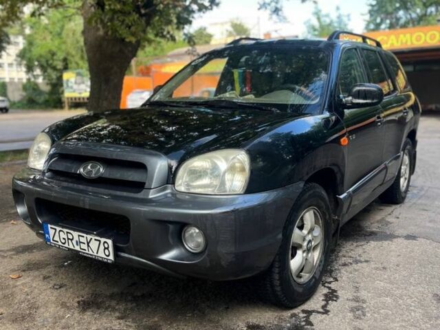 Черный Хендай Санта Фе, объемом двигателя 2 л и пробегом 350 тыс. км за 3000 $, фото 1 на Automoto.ua