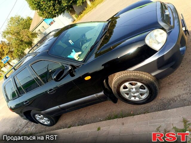 Чорний Хендай Санта Фе, об'ємом двигуна 2 л та пробігом 317 тис. км за 6900 $, фото 1 на Automoto.ua