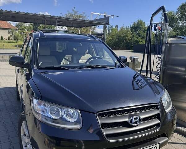 Черный Хендай Санта Фе, объемом двигателя 2.19 л и пробегом 190 тыс. км за 10200 $, фото 1 на Automoto.ua