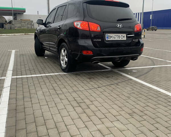 Черный Хендай Санта Фе, объемом двигателя 2.66 л и пробегом 222 тыс. км за 8999 $, фото 1 на Automoto.ua
