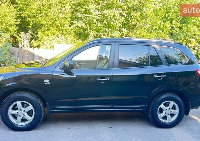 Черный Хендай Санта Фе, объемом двигателя 2.7 л и пробегом 227 тыс. км за 10700 $, фото 1 на Automoto.ua