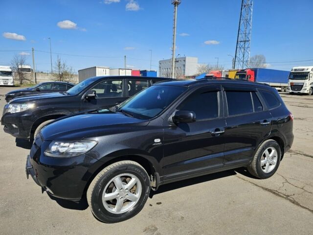 Черный Хендай Санта Фе, объемом двигателя 2.7 л и пробегом 238 тыс. км за 10000 $, фото 1 на Automoto.ua