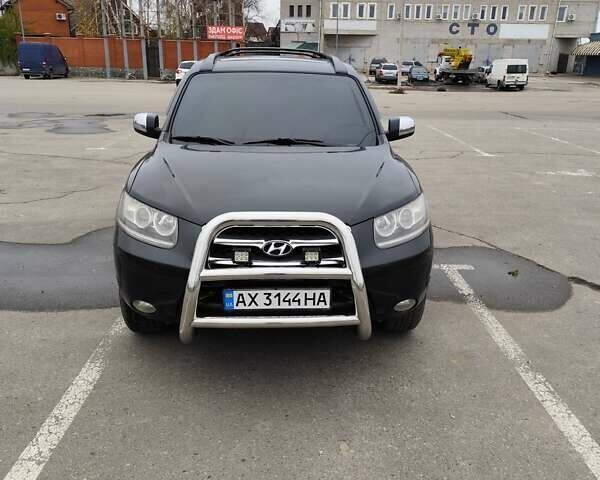 Чорний Хендай Санта Фе, об'ємом двигуна 2.7 л та пробігом 223 тис. км за 9499 $, фото 1 на Automoto.ua