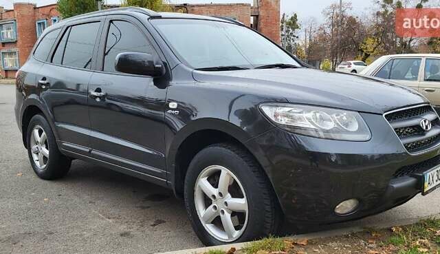 Черный Хендай Санта Фе, объемом двигателя 2.7 л и пробегом 182 тыс. км за 10000 $, фото 1 на Automoto.ua
