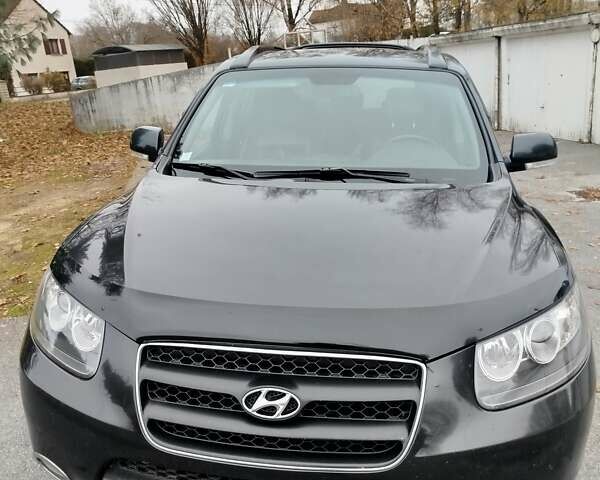 Черный Хендай Санта Фе, объемом двигателя 2.19 л и пробегом 220 тыс. км за 12000 $, фото 1 на Automoto.ua