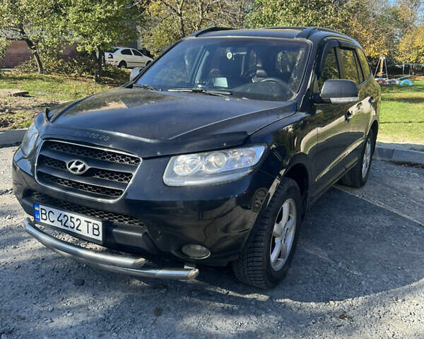 Чорний Хендай Санта Фе, об'ємом двигуна 2.19 л та пробігом 159 тис. км за 11300 $, фото 1 на Automoto.ua