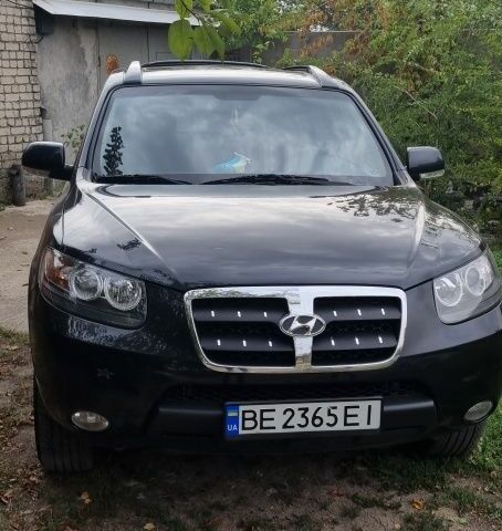 Черный Хендай Санта Фе, объемом двигателя 2.7 л и пробегом 141 тыс. км за 10600 $, фото 1 на Automoto.ua