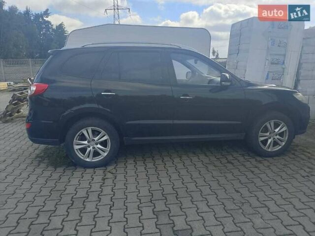 Черный Хендай Санта Фе, объемом двигателя 2 л и пробегом 230 тыс. км за 11200 $, фото 1 на Automoto.ua