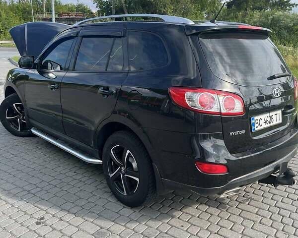 Чорний Хендай Санта Фе, об'ємом двигуна 2 л та пробігом 265 тис. км за 12200 $, фото 1 на Automoto.ua