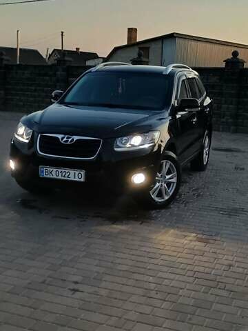 Черный Хендай Санта Фе, объемом двигателя 2.2 л и пробегом 234 тыс. км за 12700 $, фото 1 на Automoto.ua