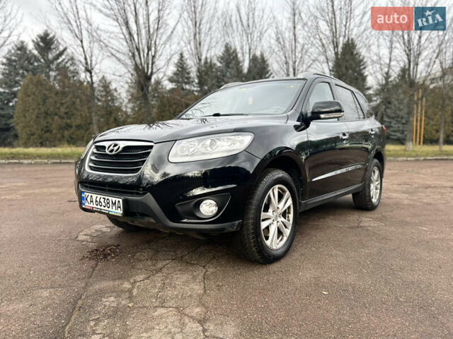 Черный Хендай Санта Фе, объемом двигателя 2.2 л и пробегом 161 тыс. км за 12499 $, фото 1 на Automoto.ua