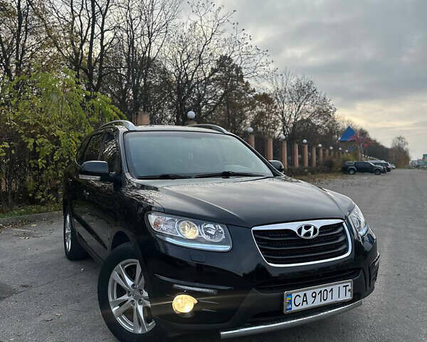 Черный Хендай Санта Фе, объемом двигателя 2.2 л и пробегом 229 тыс. км за 12499 $, фото 1 на Automoto.ua
