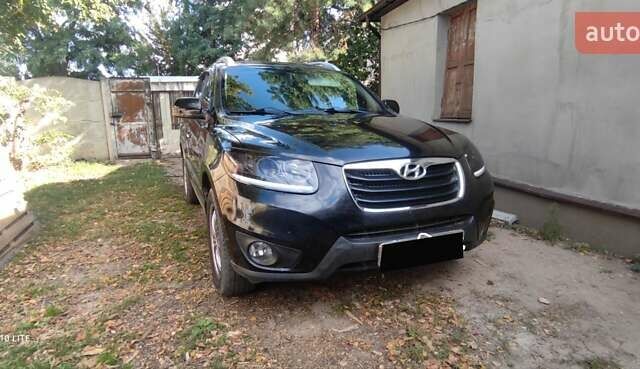 Чорний Хендай Санта Фе, об'ємом двигуна 2 л та пробігом 265 тис. км за 11200 $, фото 1 на Automoto.ua