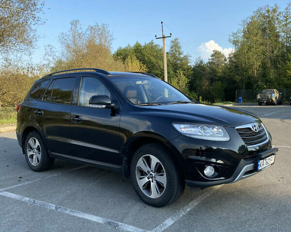 Чорний Хендай Санта Фе, об'ємом двигуна 2 л та пробігом 168 тис. км за 11200 $, фото 1 на Automoto.ua