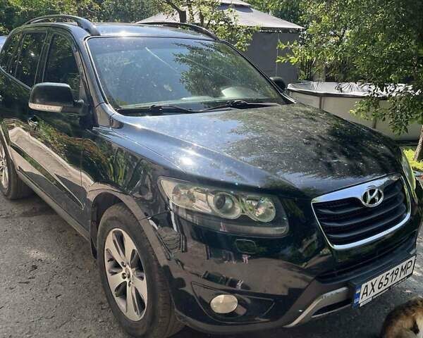 Черный Хендай Санта Фе, объемом двигателя 2.2 л и пробегом 206 тыс. км за 13500 $, фото 1 на Automoto.ua