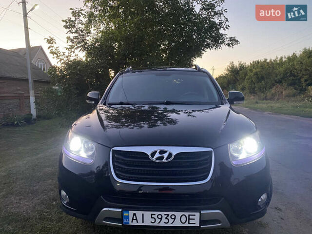 Черный Хендай Санта Фе, объемом двигателя 2.2 л и пробегом 250 тыс. км за 13500 $, фото 1 на Automoto.ua