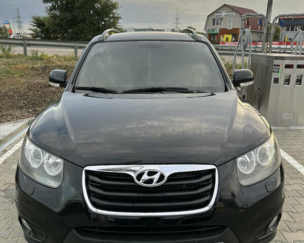 Черный Хендай Санта Фе, объемом двигателя 2.2 л и пробегом 320 тыс. км за 14500 $, фото 1 на Automoto.ua