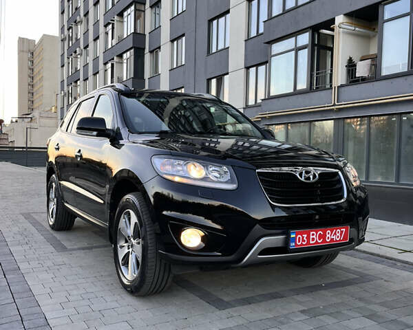 Черный Хендай Санта Фе, объемом двигателя 2.2 л и пробегом 163 тыс. км за 15800 $, фото 1 на Automoto.ua