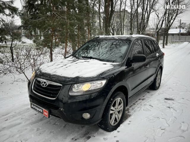 Черный Хендай Санта Фе, объемом двигателя 2.4 л и пробегом 224 тыс. км за 12990 $, фото 1 на Automoto.ua