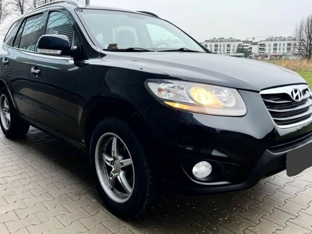 Черный Хендай Санта Фе, объемом двигателя 2.2 л и пробегом 235 тыс. км за 11550 $, фото 1 на Automoto.ua