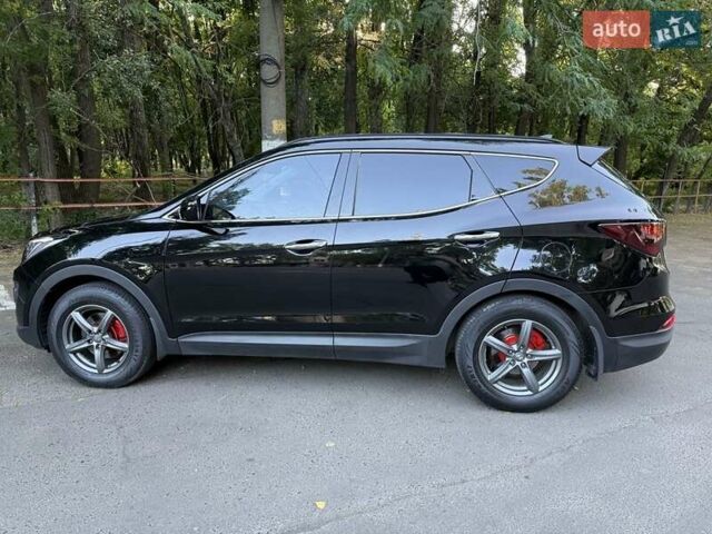 Черный Хендай Санта Фе, объемом двигателя 2.4 л и пробегом 158 тыс. км за 14500 $, фото 1 на Automoto.ua