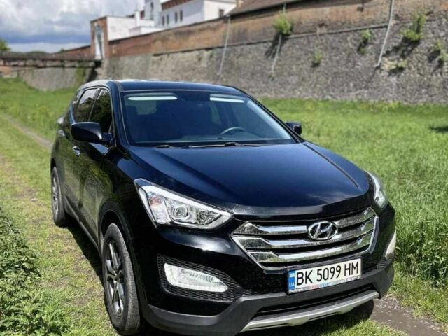 Черный Хендай Санта Фе, объемом двигателя 2.4 л и пробегом 164 тыс. км за 13500 $, фото 1 на Automoto.ua