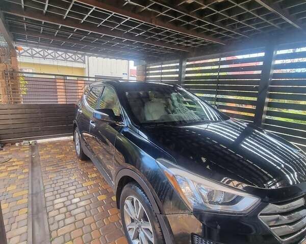 Черный Хендай Санта Фе, объемом двигателя 2 л и пробегом 141 тыс. км за 12800 $, фото 1 на Automoto.ua