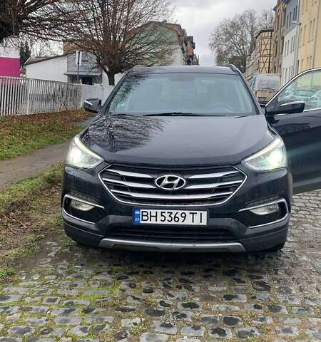 Чорний Хендай Санта Фе, об'ємом двигуна 2 л та пробігом 84 тис. км за 19446 $, фото 1 на Automoto.ua