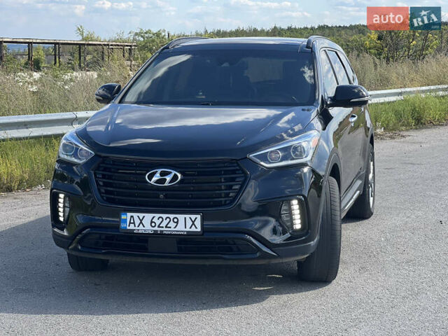Черный Хендай Санта Фе, объемом двигателя 3.3 л и пробегом 165 тыс. км за 19999 $, фото 1 на Automoto.ua