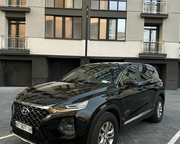 Черный Хендай Санта Фе, объемом двигателя 2.36 л и пробегом 127 тыс. км за 22900 $, фото 1 на Automoto.ua