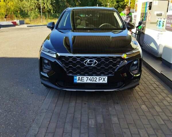 Чорний Хендай Санта Фе, об'ємом двигуна 2.4 л та пробігом 100 тис. км за 25000 $, фото 1 на Automoto.ua