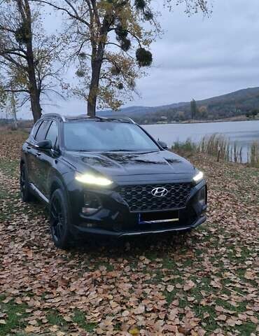 Черный Хендай Санта Фе, объемом двигателя 2.36 л и пробегом 152 тыс. км за 23700 $, фото 1 на Automoto.ua