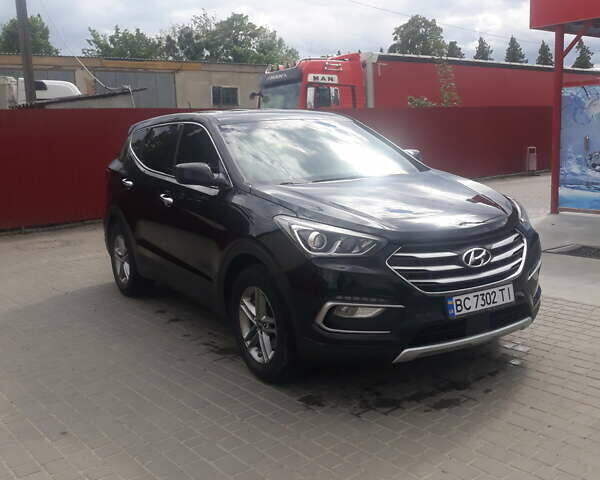 Черный Хендай Санта Фе, объемом двигателя 2.36 л и пробегом 125 тыс. км за 16700 $, фото 1 на Automoto.ua