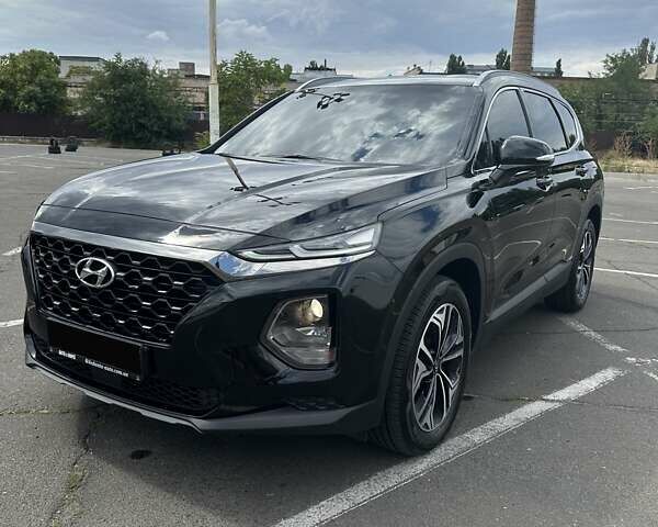 Черный Хендай Санта Фе, объемом двигателя 2 л и пробегом 165 тыс. км за 26500 $, фото 1 на Automoto.ua