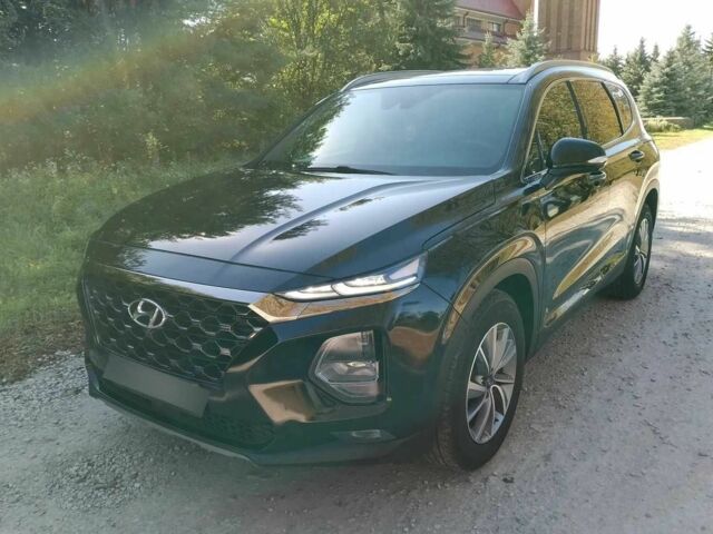 Черный Хендай Санта Фе, объемом двигателя 2.4 л и пробегом 106 тыс. км за 11999 $, фото 1 на Automoto.ua